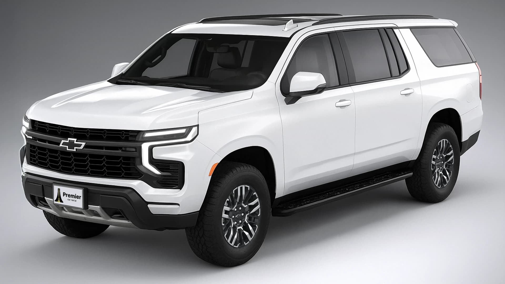 White Chevy Suburban representing the Premium Full-Size SUV class