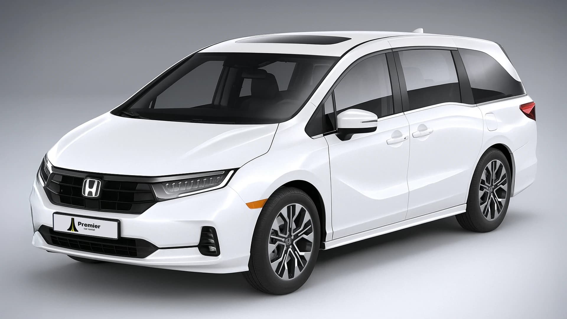 White Honda Odyssey representing the 8 Passenger Minivan class